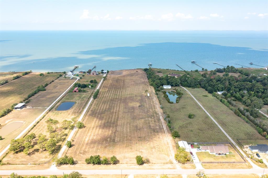 This 15 acre property sits on approximately 420 feet of unobstructed Trinity Bay water frontage.

FEATURES 
- Cleared acreage 
- Public Sewer
- Public Water
- Bulkhead 
- Agg exempt
- Unrestricted