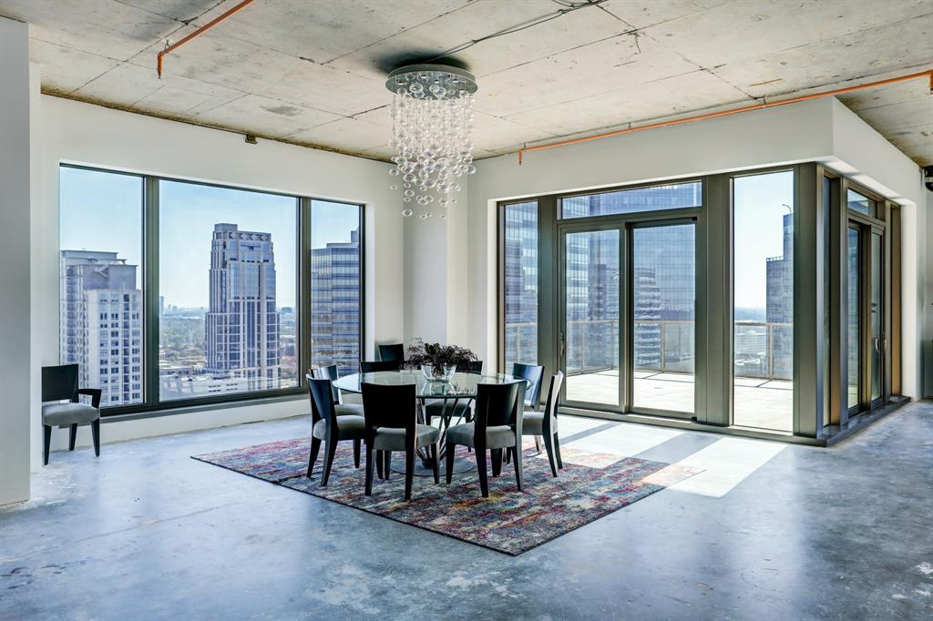 High celings add to the grandeur of this penthouse condo.