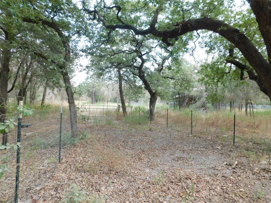 5.422 ACRES of land in Caldwell, TX suitable for building a home, log cabin or place a RV on established concrete pad. It is situated in a wooded area with electricity and fenced. Property offers seclusion and tranquility for those looking for a quiet retreat. Land is near the Cade Lakes and minutes from Historic Caldwell: shopping, entertainment, restaurants. Land has ample trees, electricity, fenced. Call today for your viewing!