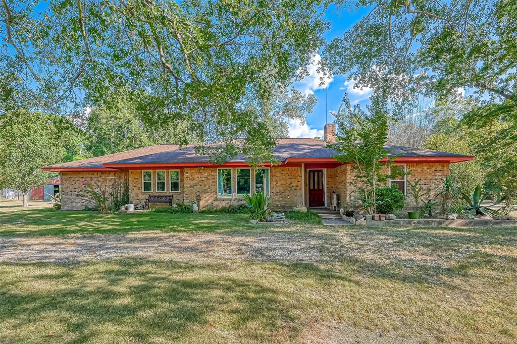 27960 Country Colony Drive Splendora, Texas This amazing 3200 square foot home sits on 5+ acres of unrestricted land in sought-after Splendora ISD, only minutes away from major highways and shopping. Inside you will find a spacious living area with lots of natural sunlight that opens up to the kitchen/dining area that features upgraded appliances a beautifully enlarged, custom island, and a wood-burning fireplace. There are four large bedrooms and two full bathrooms. Outside you will find a shed, and a 30x30 barn withstables offers endless possibilities due to its space and electricity. This property is boasting with potential 2020 double paned windows, electrical, and 50 galloon Rheem water heater. Don't let this one get away! Schedule a private showing today!