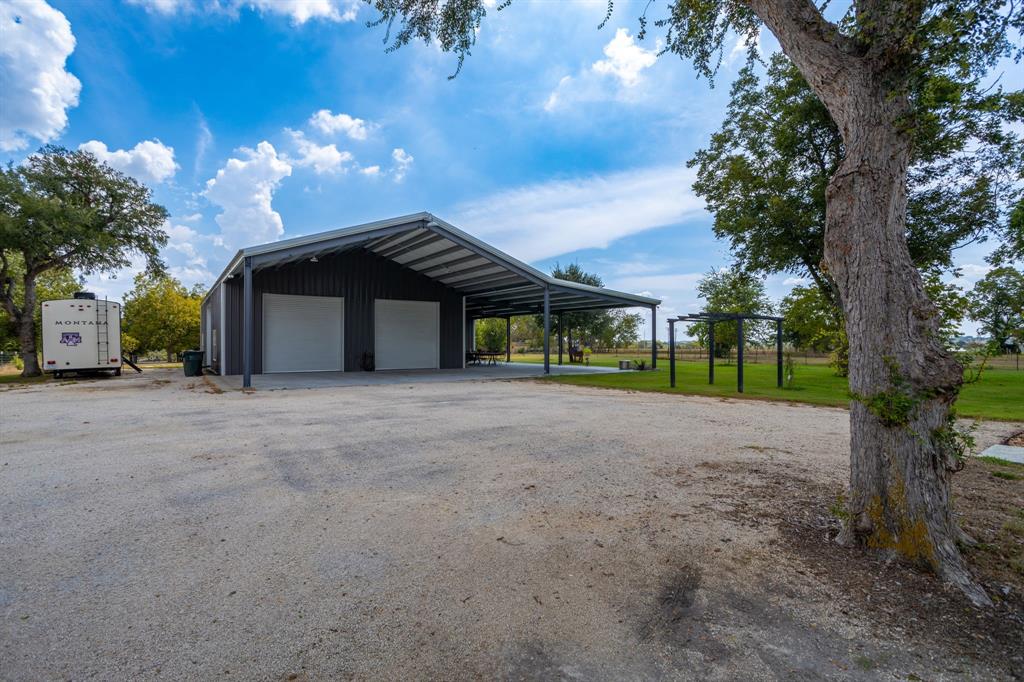 Shop entrance/covered carport