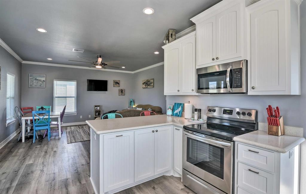 Granite countertops and stainless steel appliances appliances.