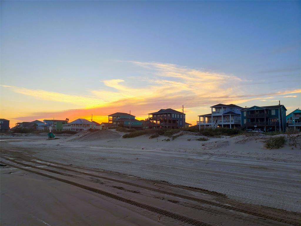 The day isn\'t complete without a sunset stroll on the beach.