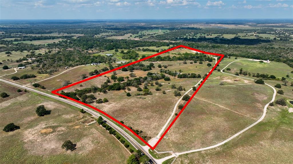 Great Views. Ultimate Privacy. Abundant Wildlife. This 76.27 acres has it all. You can see for miles from the top elevation and there are multiple building sites for your dream home. The acreage backs to Nails Creek in Lake Somerville State Park securing your future privacy. There are 2 ponds that provide for great duck hunting and the deer grow big here! Utilities include power on the property near possible home sites and county water at the road. Lake Somerville, only 4 miles away, offers recreational opportunities. Burton is 10 minutes away and Round Top's shops and restaurants are a short 20 minute drive. With easy access to Hwy 290, Houston is a 1 1/2 hour drive and Austin is an easy hour and 20 minutes away. For tax purposes the property has an agricultural tax valuation.
Call today for a guided tour.