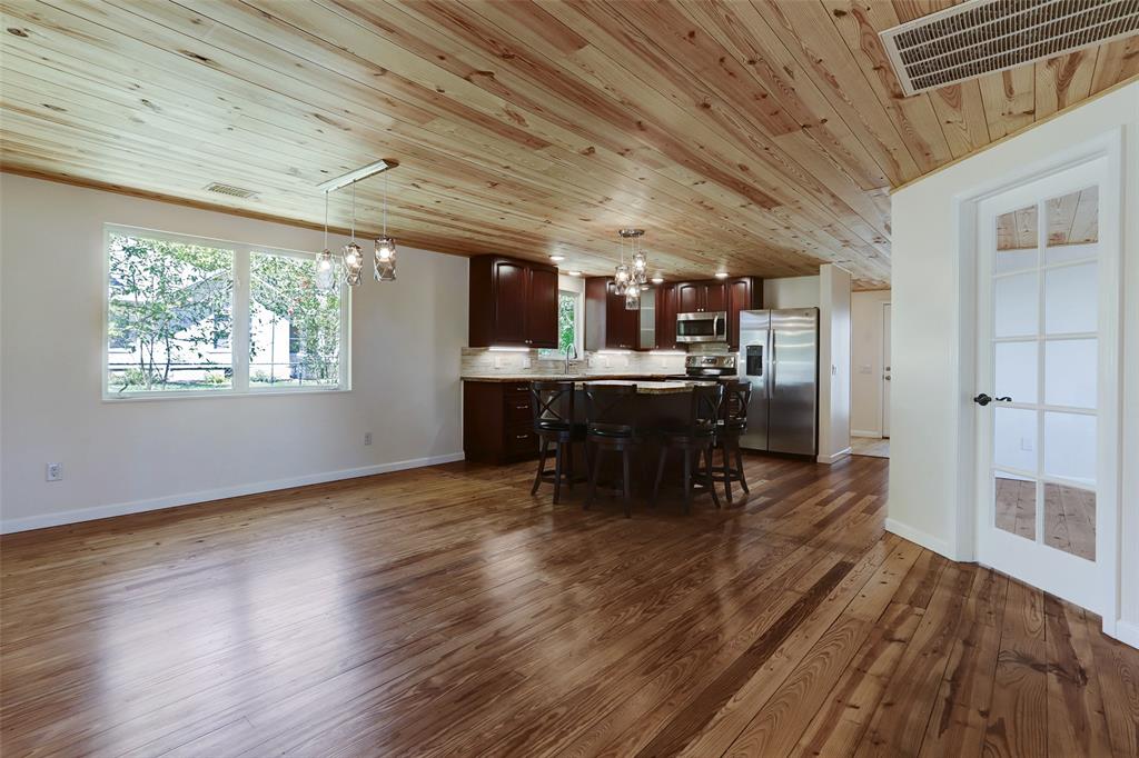 New large casement windows fill the space with light.