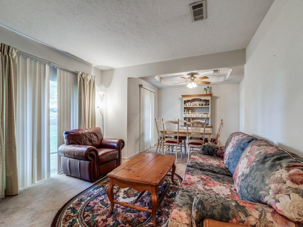 Front Door opens to hallway off dining/living room