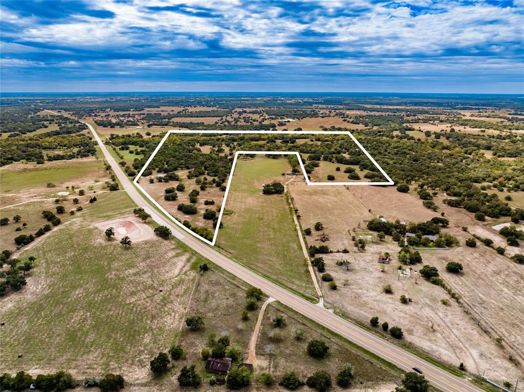 Nestled in the heart of picturesque countryside, this +/- 96-acre cattle and recreational ranch offers a unique opportunity to embrace the beauty of nature while enjoying the benefits of ranch living. Located on the outskirts of Hallettsville, with the option to purchase an additional 400 acres, this expansive property offers a perfect homesite for a peaceful rural lifestyle while remaining accessible to nearby towns and amenities. The ranch features abundant beautiful live oak trees amongst the rolling terrain, ample pastureland ideal for cattle grazing, and access to fresh water along Clark’s Creek. Beyond its agricultural potential, this property offers diverse recreational opportunities. Explore endless possibilities such as hunting deer, hogs, and birds, horseback riding, and ATV adventures for all those outdoor enthusiasts. This Ag Exempt property promises the opportunity to turn your vision into reality.