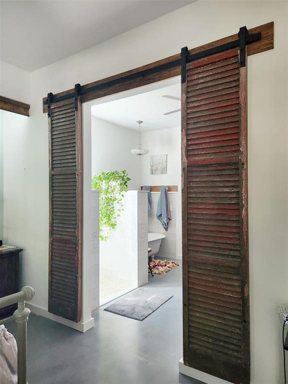 Barndoors between Primary Bedroom and En-suite Bathroom