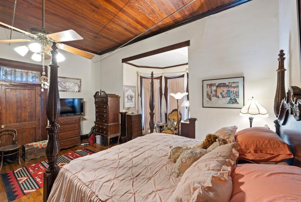 Here is another view of the primary bedroom. This king-size bed shows that this room will have more than enough space for your furniture.