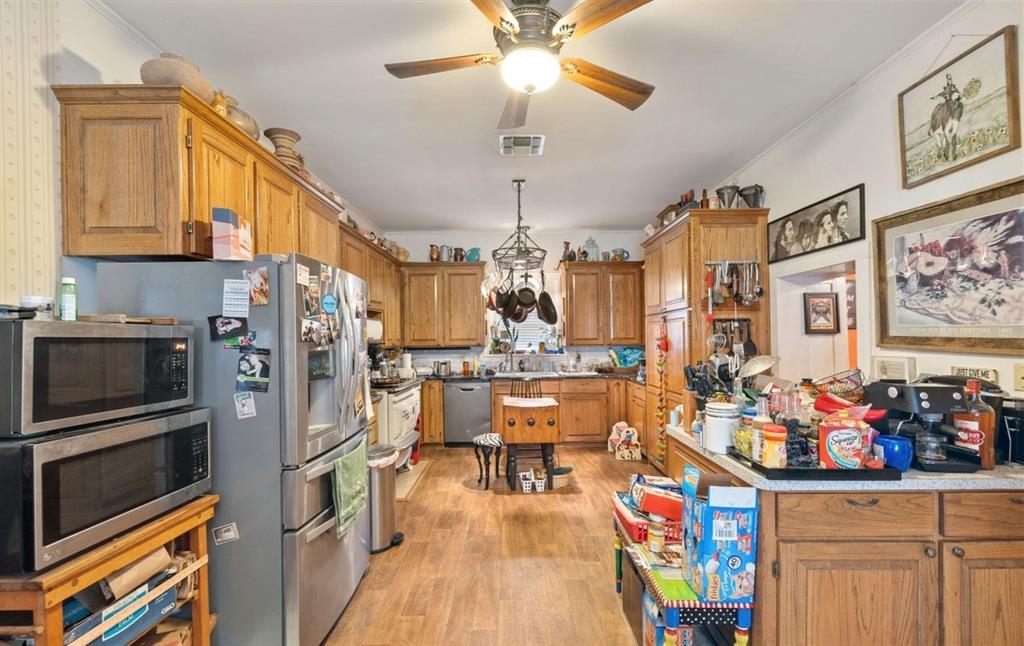 Prepare a feast in your large kitchen with plenty of cabinets.