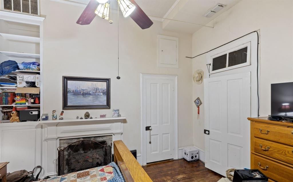 Another view of the second bedroom downstairs; a gas logs fireplace, but it can easily be converted back to wood burning.