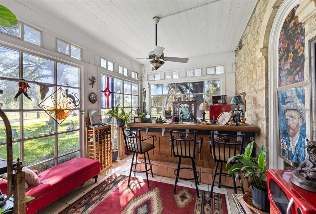 This was a porch, part of it was converted into this sunroom. It is simply awesome for entertaining guests.