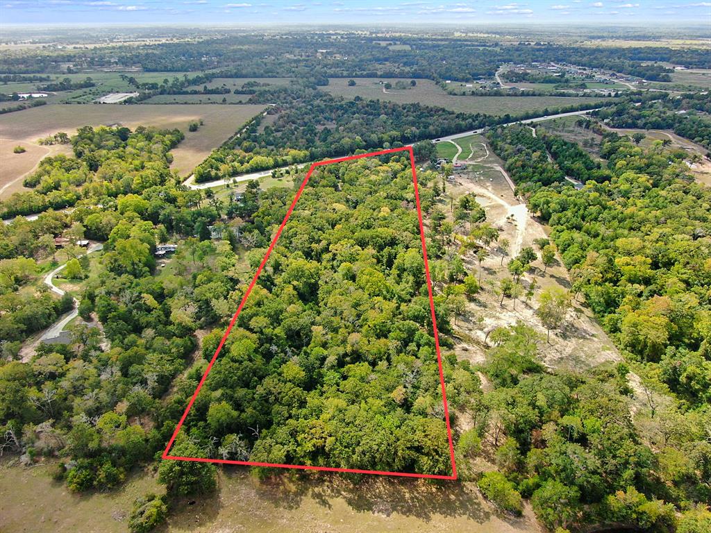 Great opportunity to own over 10 acres of UNRESTRICTED property located on HWY 21. Partially cleared and fenced with lots of mature trees. Gated, electricity on site and water available. Only 20 minutes outside of Bryan College Station, 15 minutes from Madisonville, and only 1 1/2 hours from Houston. Lots of possibilities and so much potential with this prime location! Schedule your tour today!