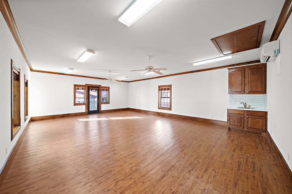 Easily customize this second-floor flex space with a wet bar and balcony into a game room, a private study, or any other room that suits your needs.