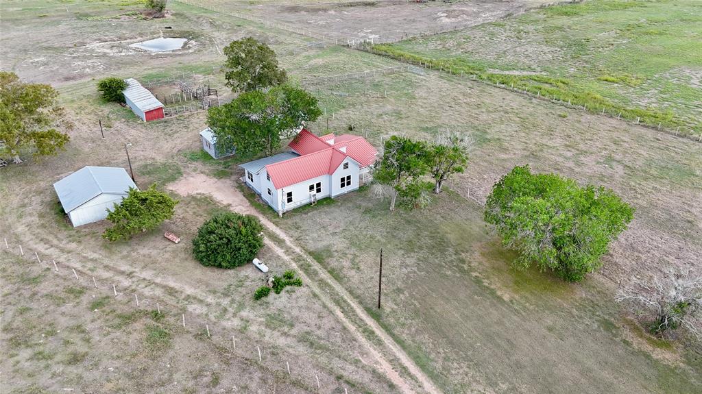 Comprised of 44.4 acres of AG Exempt, Unrestricted land, just North of Moulton, Texas. The property includes improved pasture with cross fencing and two ponds. Easy access comes by way of State Highway 95 road frontage, along with county road access on the back side of the property. The farmhouse sits atop the highest point of land, and offers a great opportunity for agricultural use with barns and pens which could be used for working cattle, FFA or 4-H animal projects. The property is located just 1 1/2 hours from Austin, Houston, and San Antonio. Don't miss your chance!!