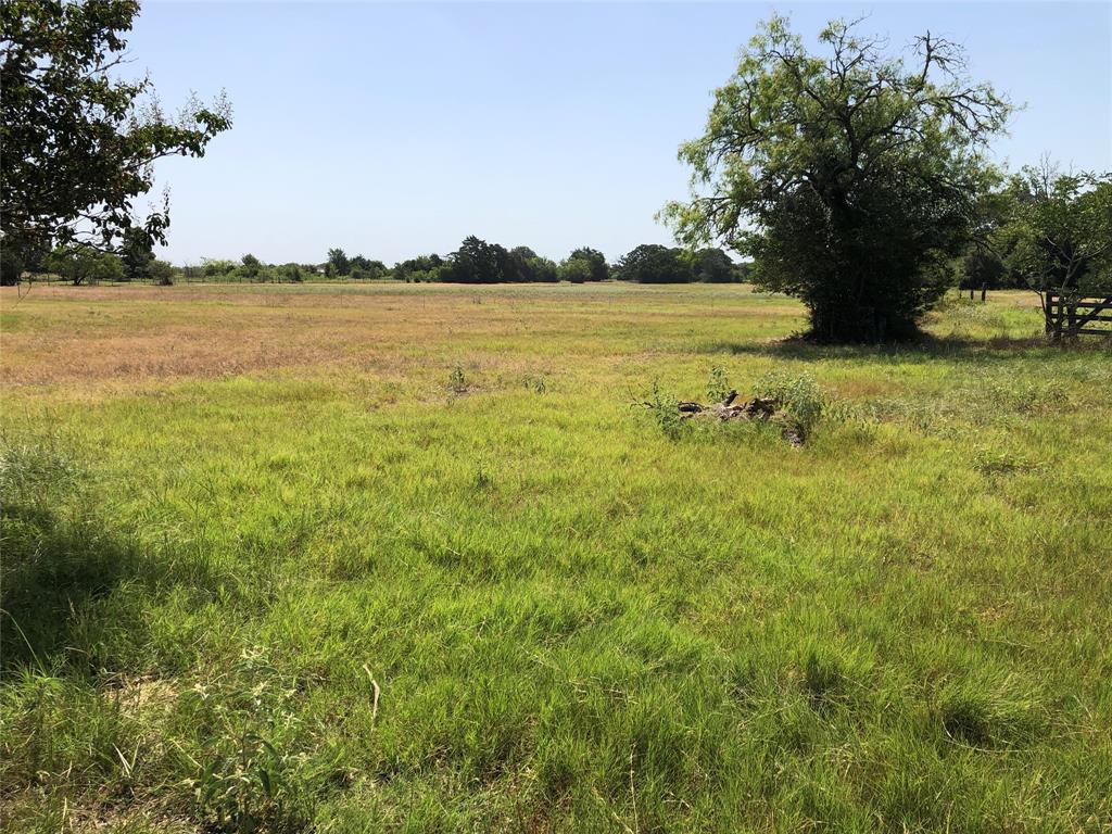 Great tract for agricultural, rural living and recreation. 58.62 acre, 1,469 sf home, three barns, and one metal building. Good rolling pasture land with 3 stock tanks in place. Only 15 minutes for Bryan. Brochure available in attachments.