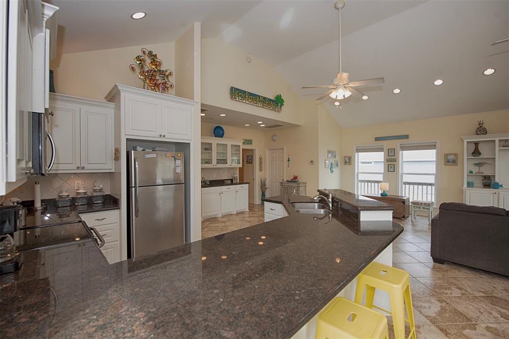 The gorgeous breakfast bar is perfect for your morning coffee or a quick breakfast. Counters are gorgeous granite and also provide great additional prep space.