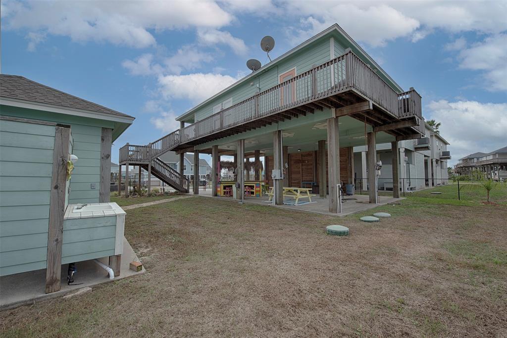 A view from the backyard to the home. Great area for the kids to play or the family dog to fun. As the yard is fully fenced, nothing to worry about.