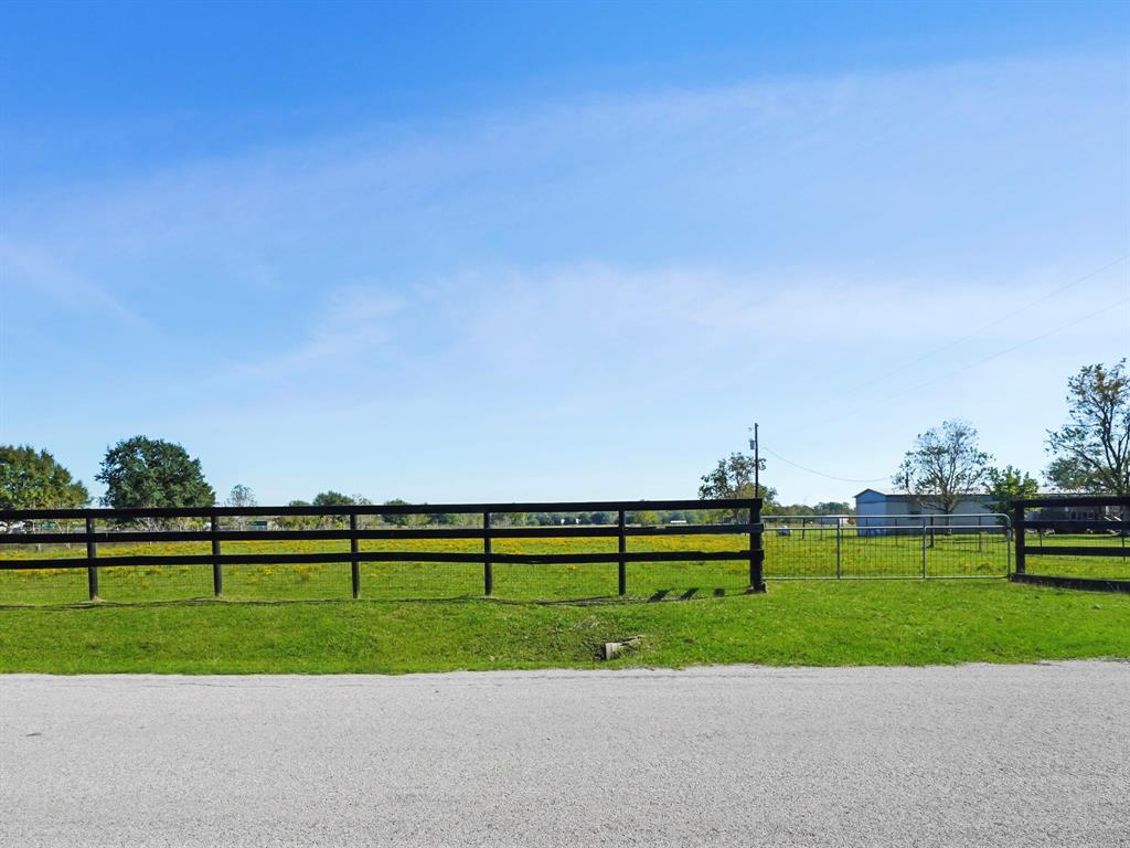 Gated entrance of this beautiful cleared land!