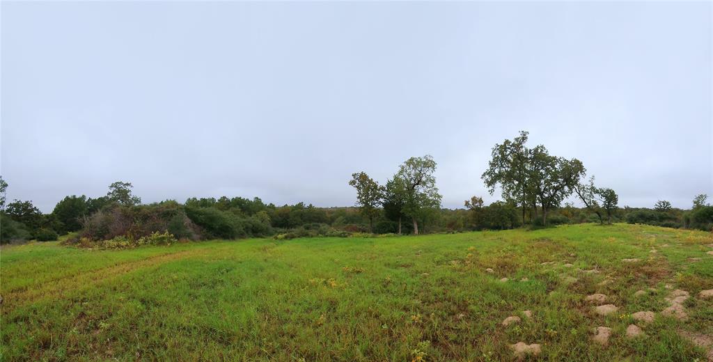 This hilltop location would make a great home site. It is set back by approx. 100 years from the front gates and set off from the entrance gate by a swath of trees and brush that provides awesome privacy.  Look at the long views!