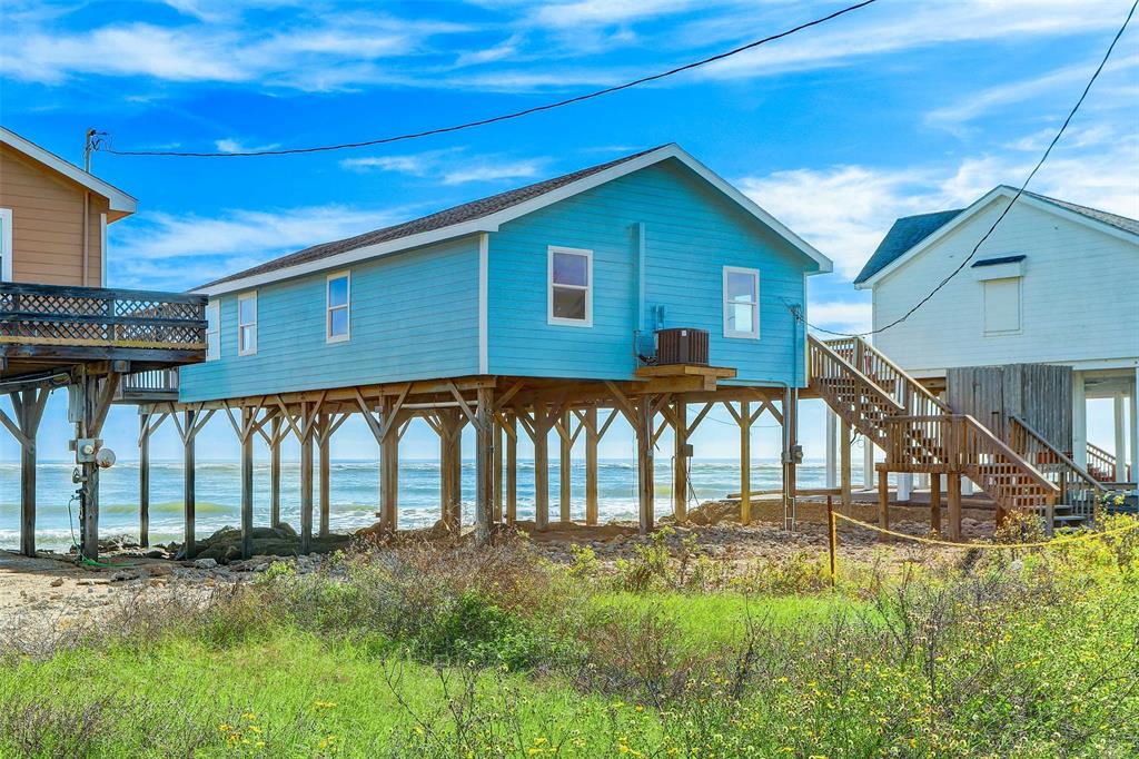 THE REAR VIEW OF THIS WONDERFUL HOME.