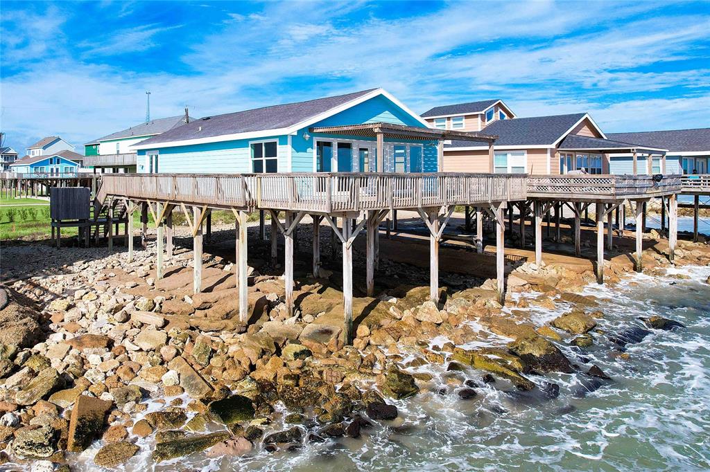 THIS INCREDIBLE DECK IS THE PERFECT PLACE TO BREATHE IN THE OCEAN BREEZE AND LISTEN TO THE WAVES.