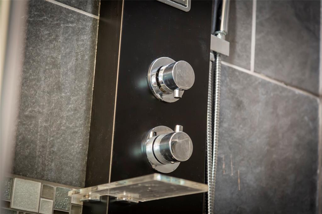 Shower fixtures in baths