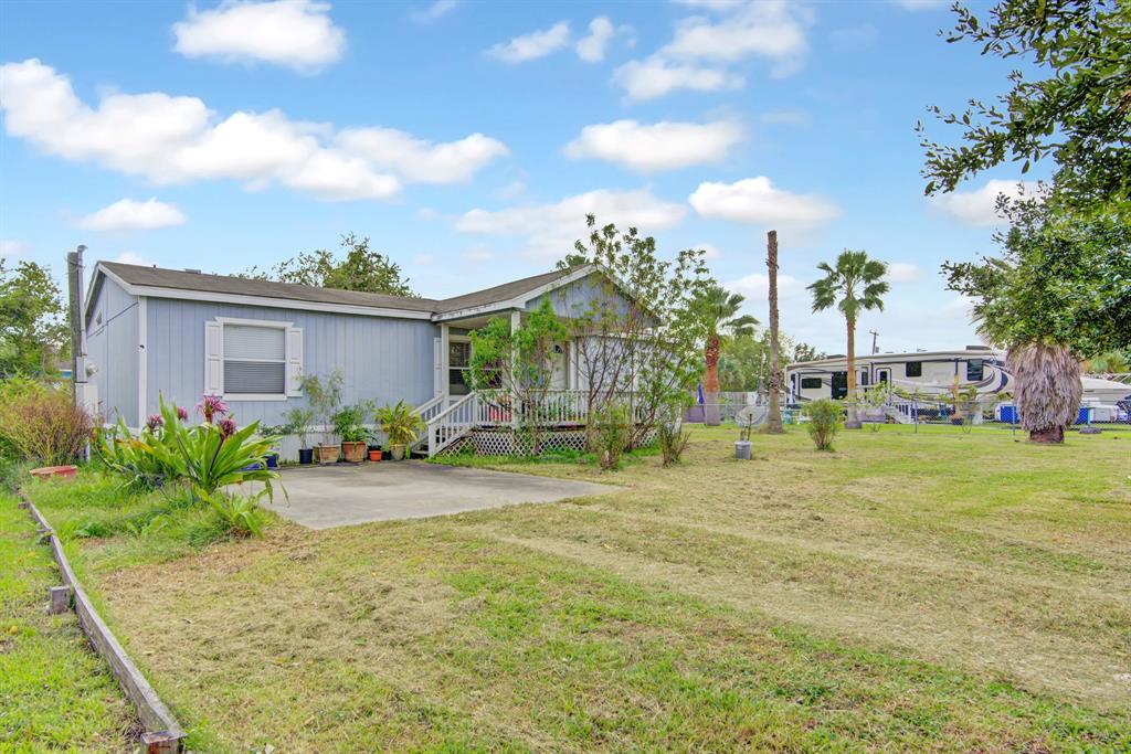 The front of your home opens to a versatile yard—your canvas for outdoor living, gardening, and endless imaginative possibilities.