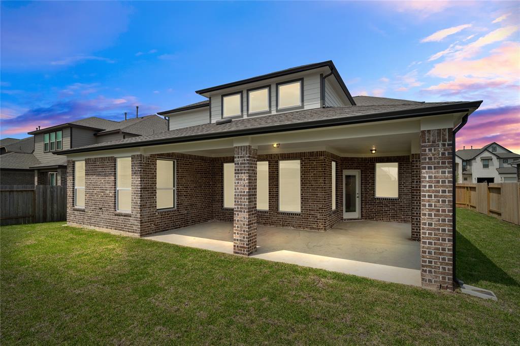 Come and see this spacious backyard with its beautiful covered patio and paved walkway down the side yard. There is plenty of room for the kids to play and adults to relax! Perfect for your outdoor living space, patio furniture, bbq pit, and so much more. The possibilities are endless!