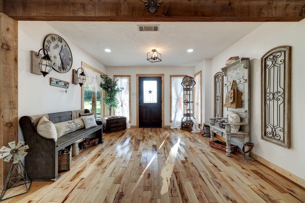 Another view of this foyer. To the left, is the Homes Formal Dining Room. We are thrilled to introduce you to a truly unique and extraordinary property that seamlessly combines the comfort of a beautiful home with the opportunity for a picturesque celebration destination.