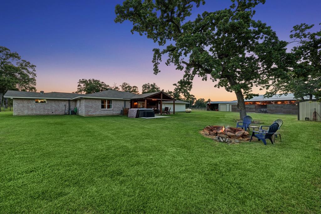 Professionally manicured landscaping front and back. This Home is located in a sought after area. Easy access to shopping, I10 and Houston. The propane only runs the Range in the main home. The home experienced no loss power during the freeze because they have a co-op electricity.