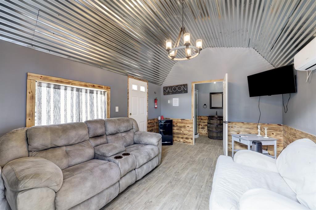 1 of 2  Barndominium featuring a bathroom in each of them, this one is designed for the males/groomsmen.