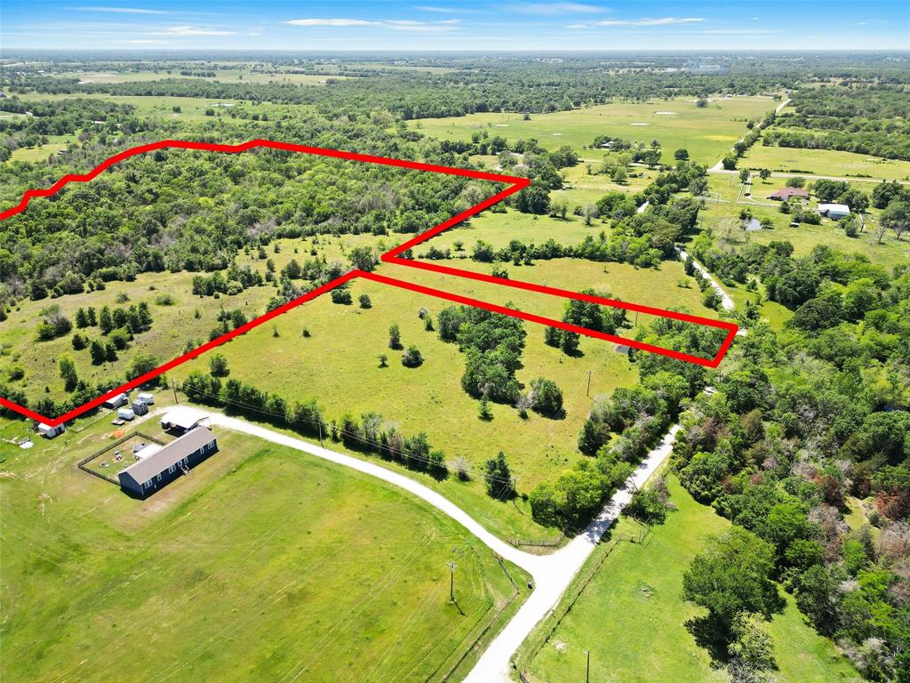 Experience the beauty of country living with this 31-acre lot in Midway, TX. With no known restrictions, the possibilities are endless for what you can create on this land. The property boasts an array of mature trees, making it an ideal location for those seeking privacy and serenity. Conveniently located just a short drive from the town of Madisonville, this lot provides the perfect balance of seclusion and accessibility. Whether you're looking to build your dream home, a leisure ranch, or even a weekend getaway, this property offers a rare opportunity to make your vision a reality. Don't miss out on this chance to own a piece of Texas paradise.