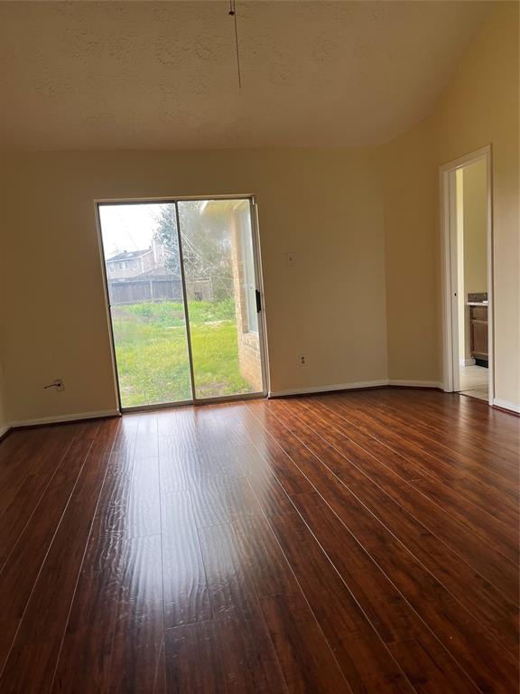 Primary Bedroom with french doors to backyard