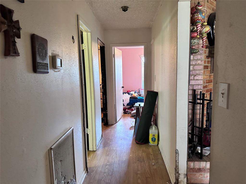 Hallway between Primary and Bedrooms