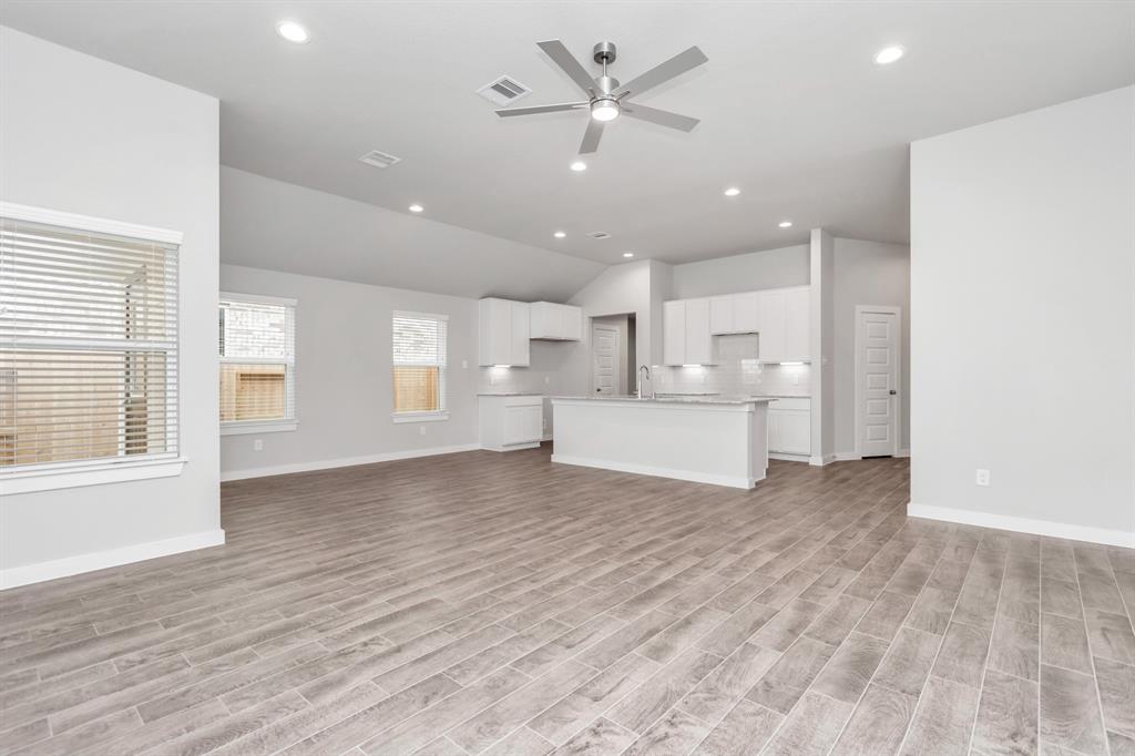 Take another glimpse into the heart of the home with this additional view of the family room—a sprawling space ready to accommodate all your gatherings.