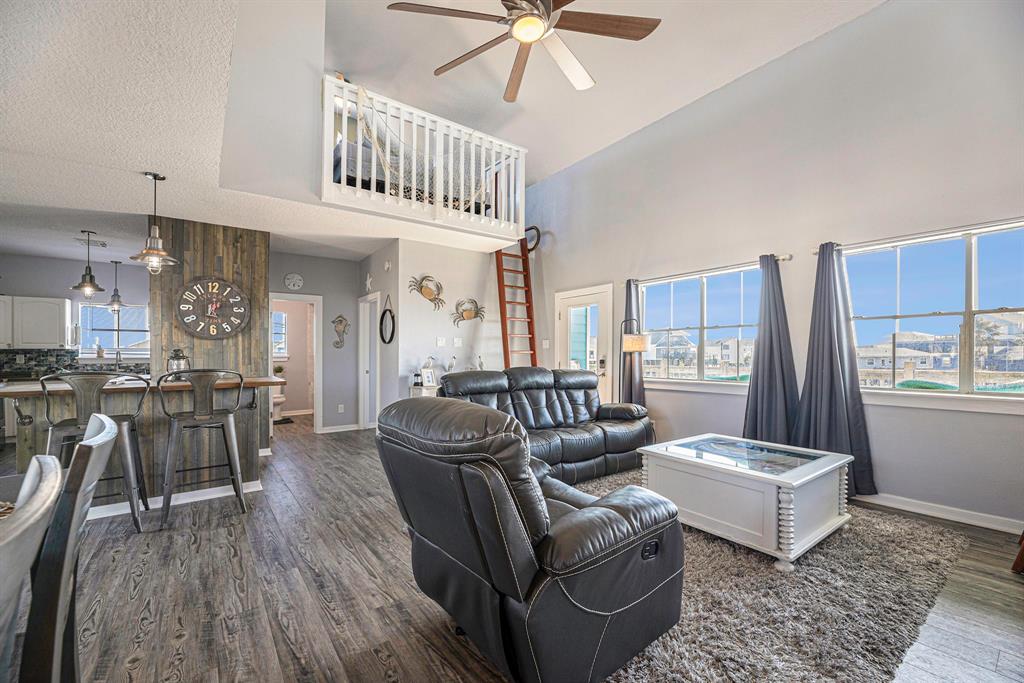 The lofts look down into the living area