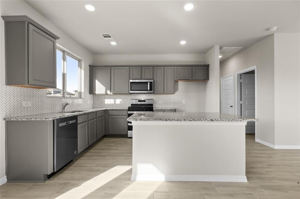 Kitchen Island Overlooking Breakfast Nook