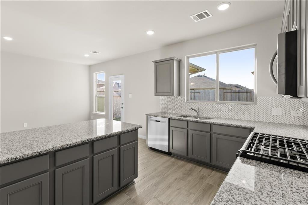 Kitchen Island Overlooking Breakfast Nook