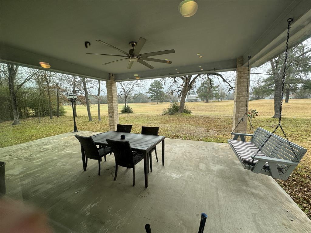 Covered back porch overlooking gold course