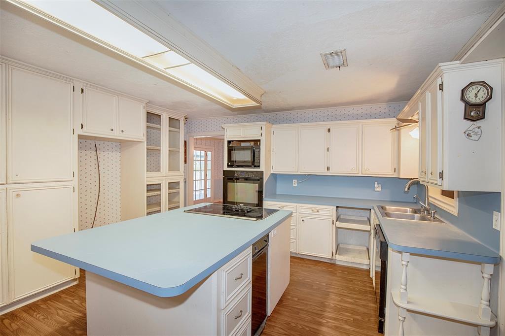 The kitchen has a wonderful layout and large island.