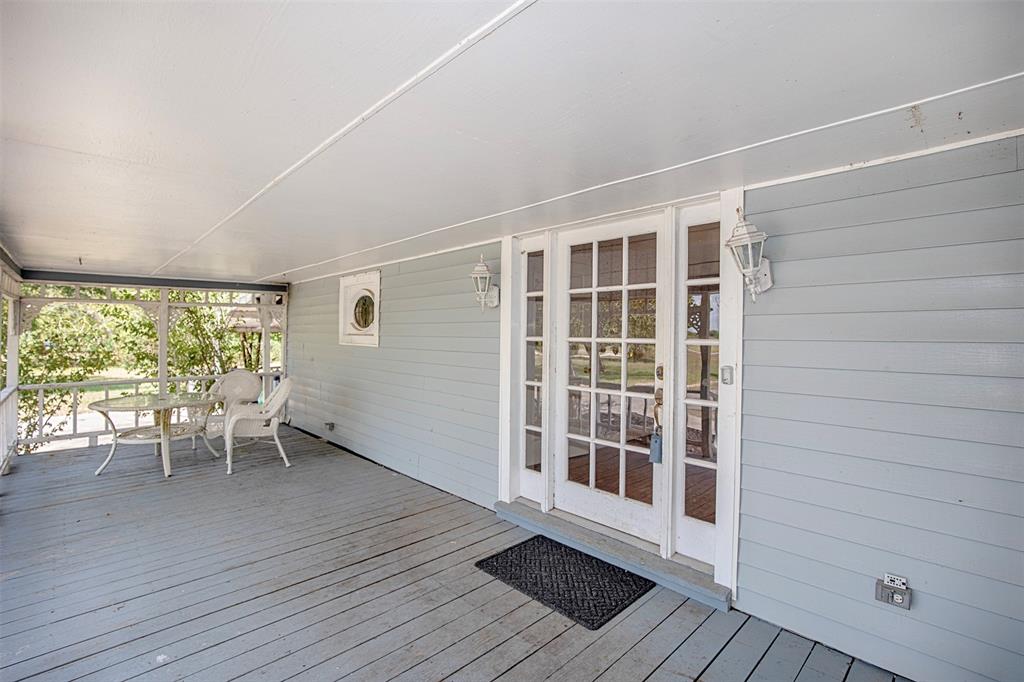 Huge porch with plenty of space for a table and chairs where you can set any time of day and enjoy a cold beverage.