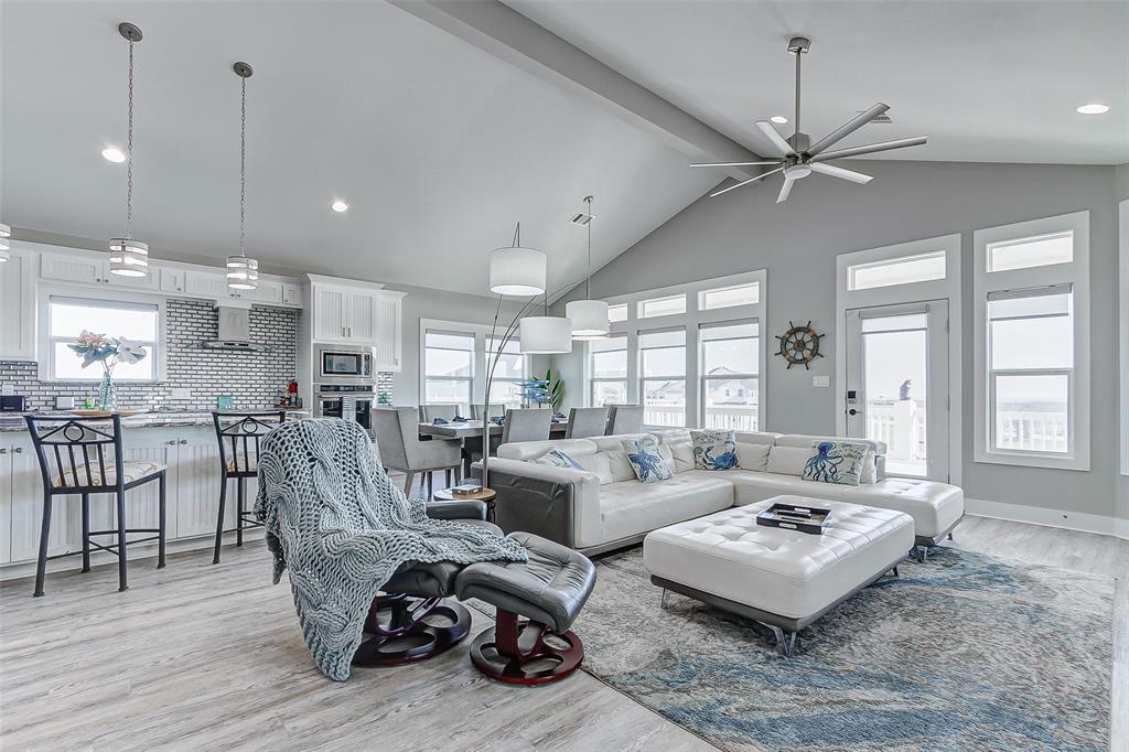 View of the living room, with Dining Room and Kitchen in the background.