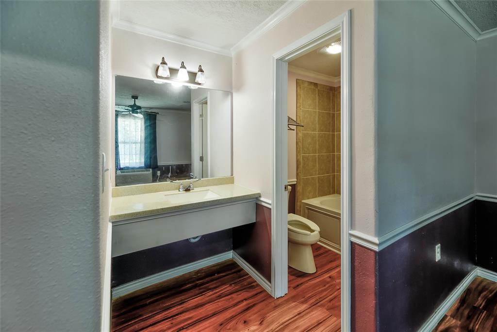 Sink with vanity area in each room.