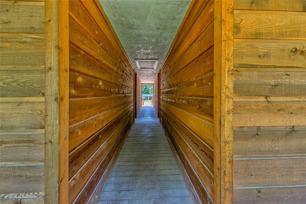 Long hallway helps to separate and divide the 4 apartments/offices.