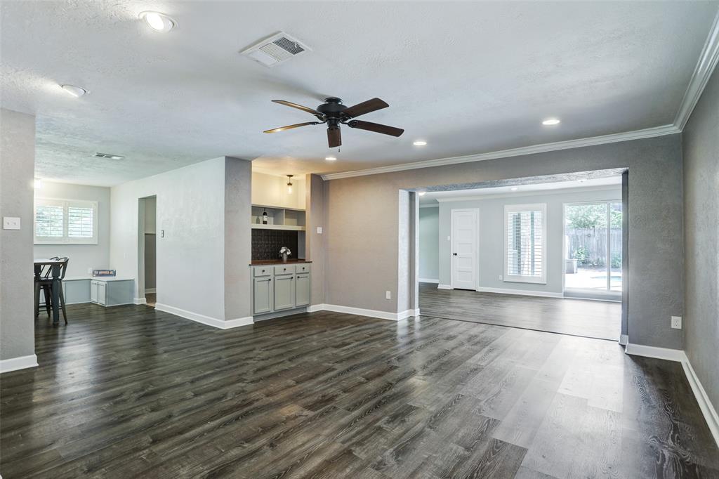 View of den and game room from foyer