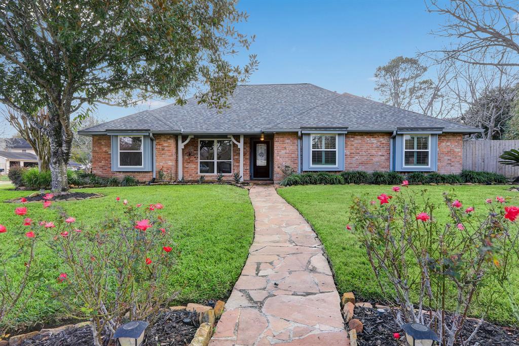 Front yard with stone walk way