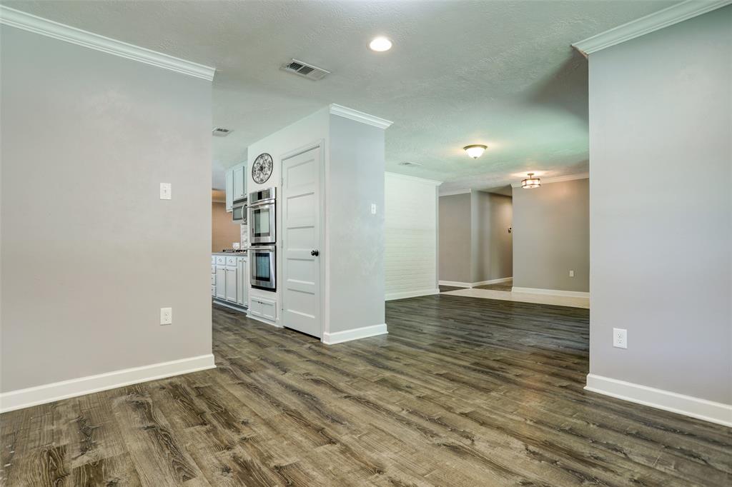 View from dining through formal living space to foyer