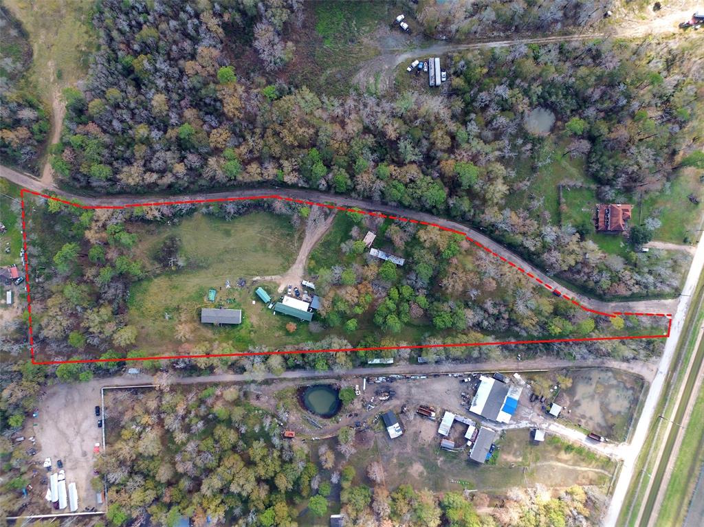 Approximately 5.42 acres of land with several mobile homes that will stay with the sale.  Buyer will need to purchase a survey.  Property is located near Deussen Parkway.