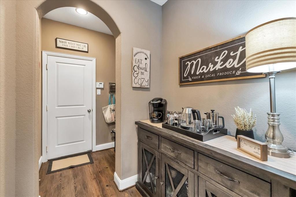 Butler Pantry with pantry across from this area and MUD room area leading to garage.